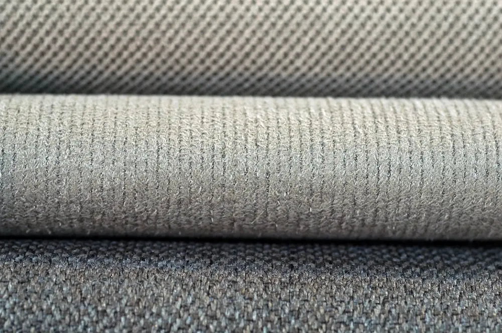 stack of nylon carpets