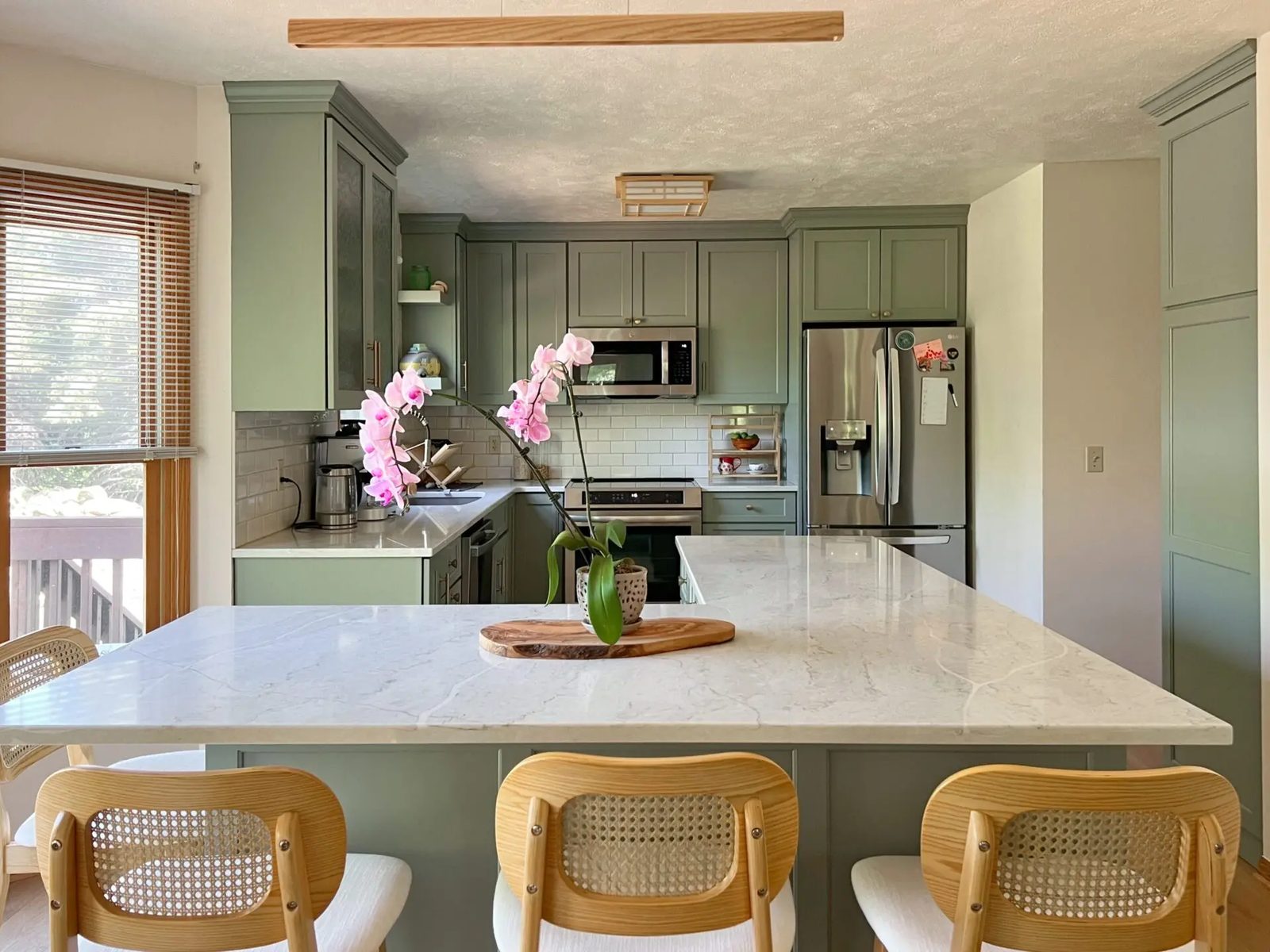 Sage green kitchen remodel Round Rock TX with quartz countertops