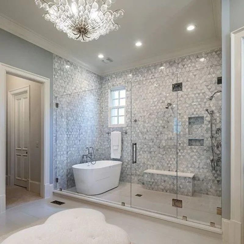 Walk-in shower design inspiration with hexagon tile